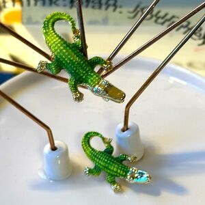 Reptile broaches.